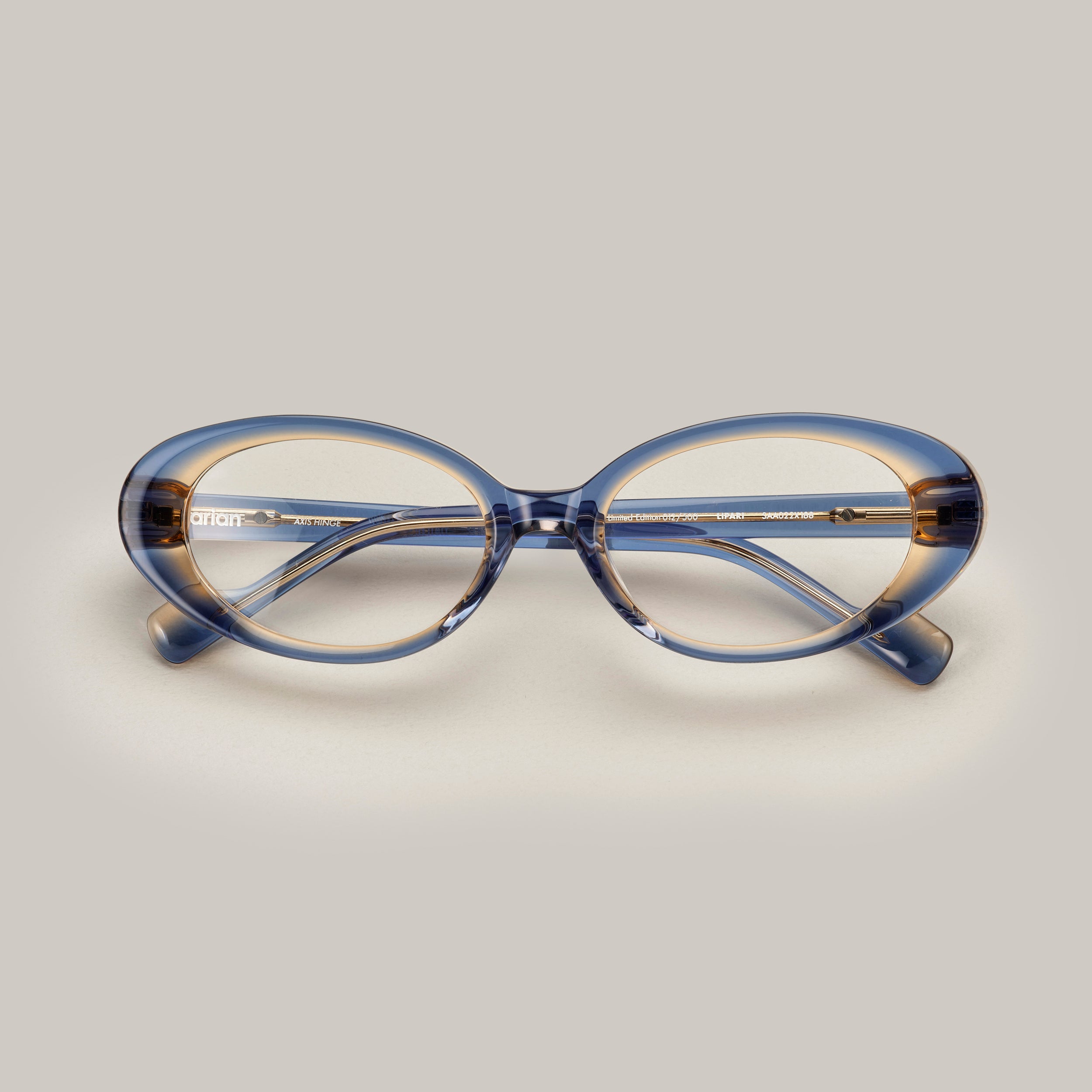 Tarian-Lipari-small-oval-cateye-eyewear-clear-blue-yellow