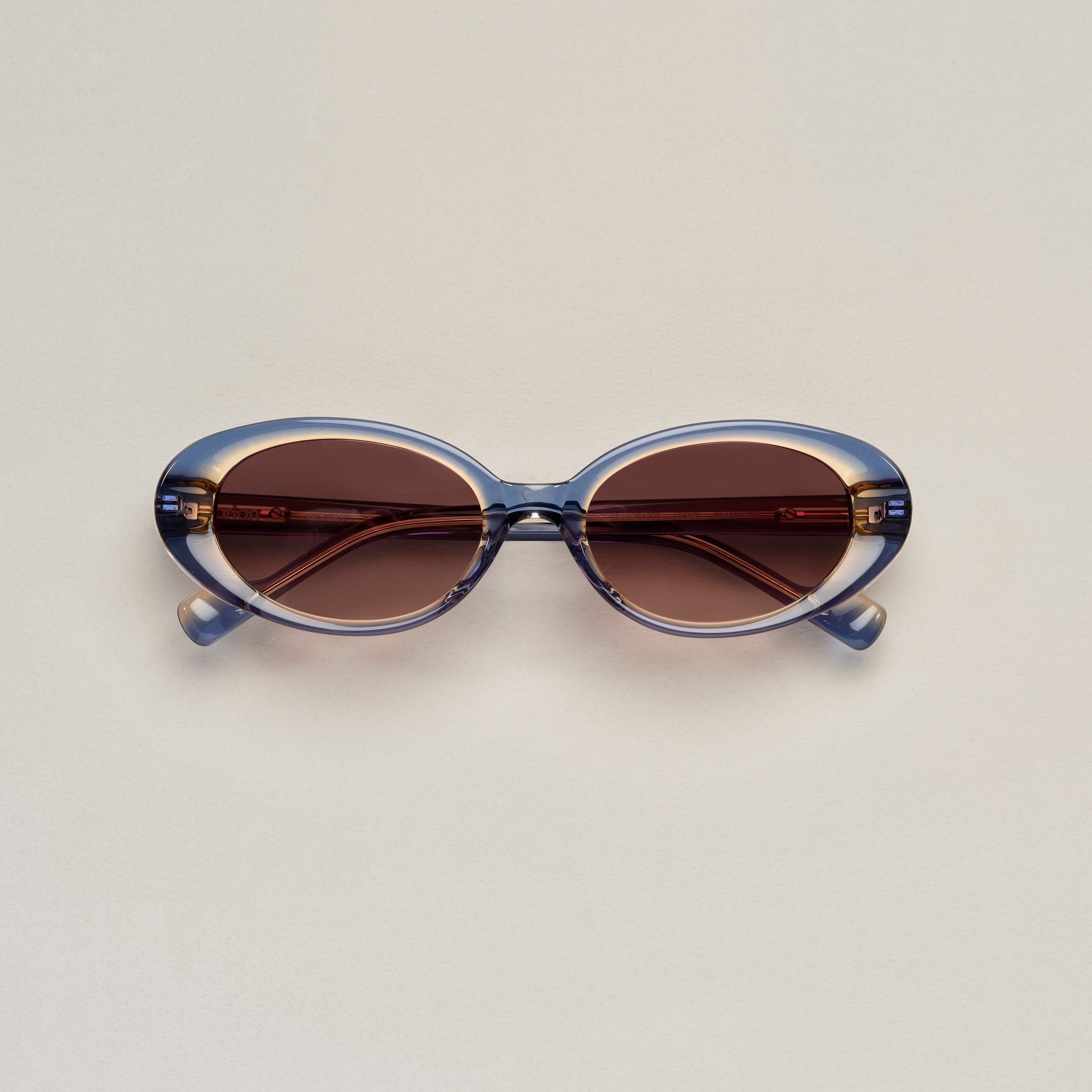 Tarian-Lipari-small-oval-cateye-sunglasses-clear-blue-clear-yellow