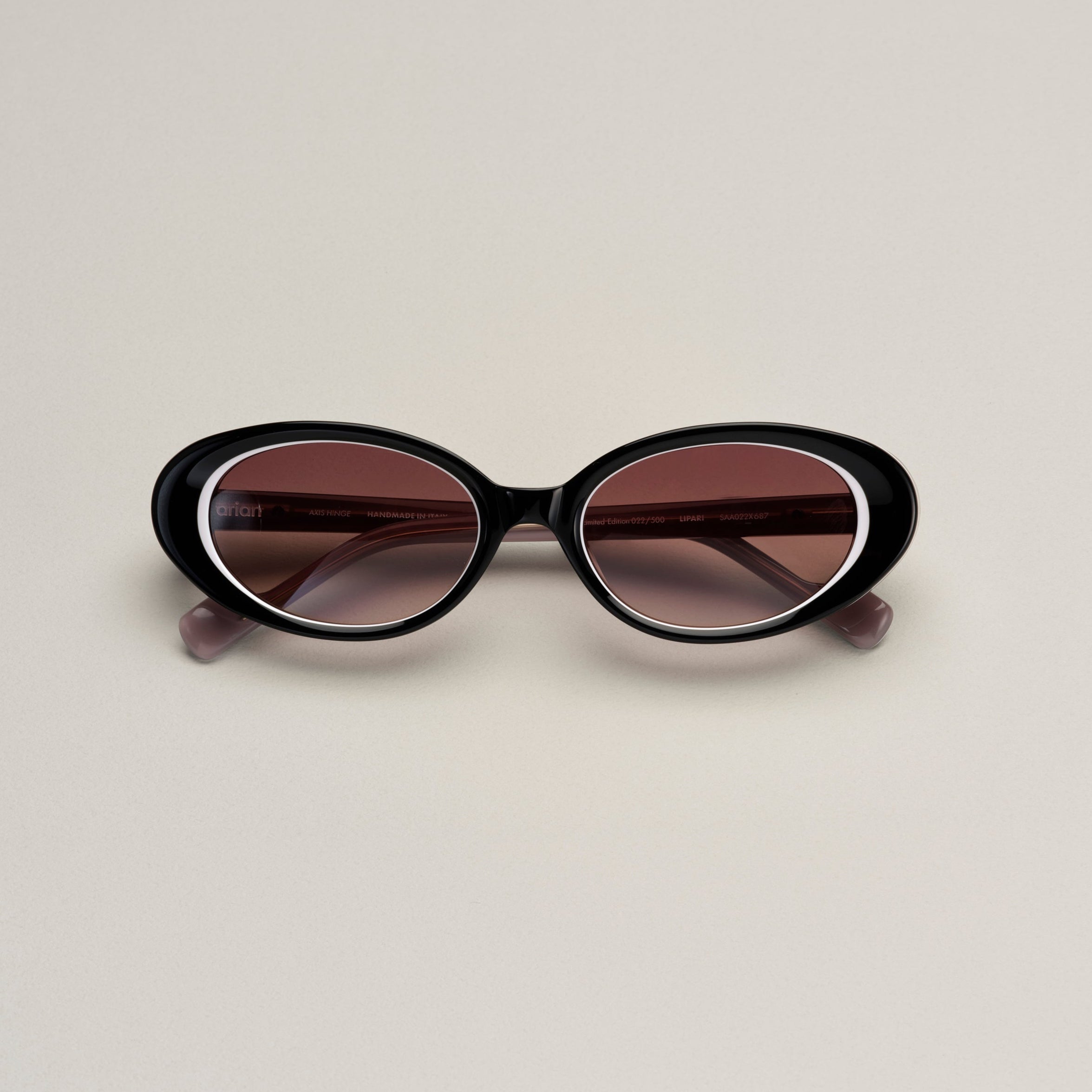Tarian-Lipari-small-oval-cateye-sunglasses-black-white