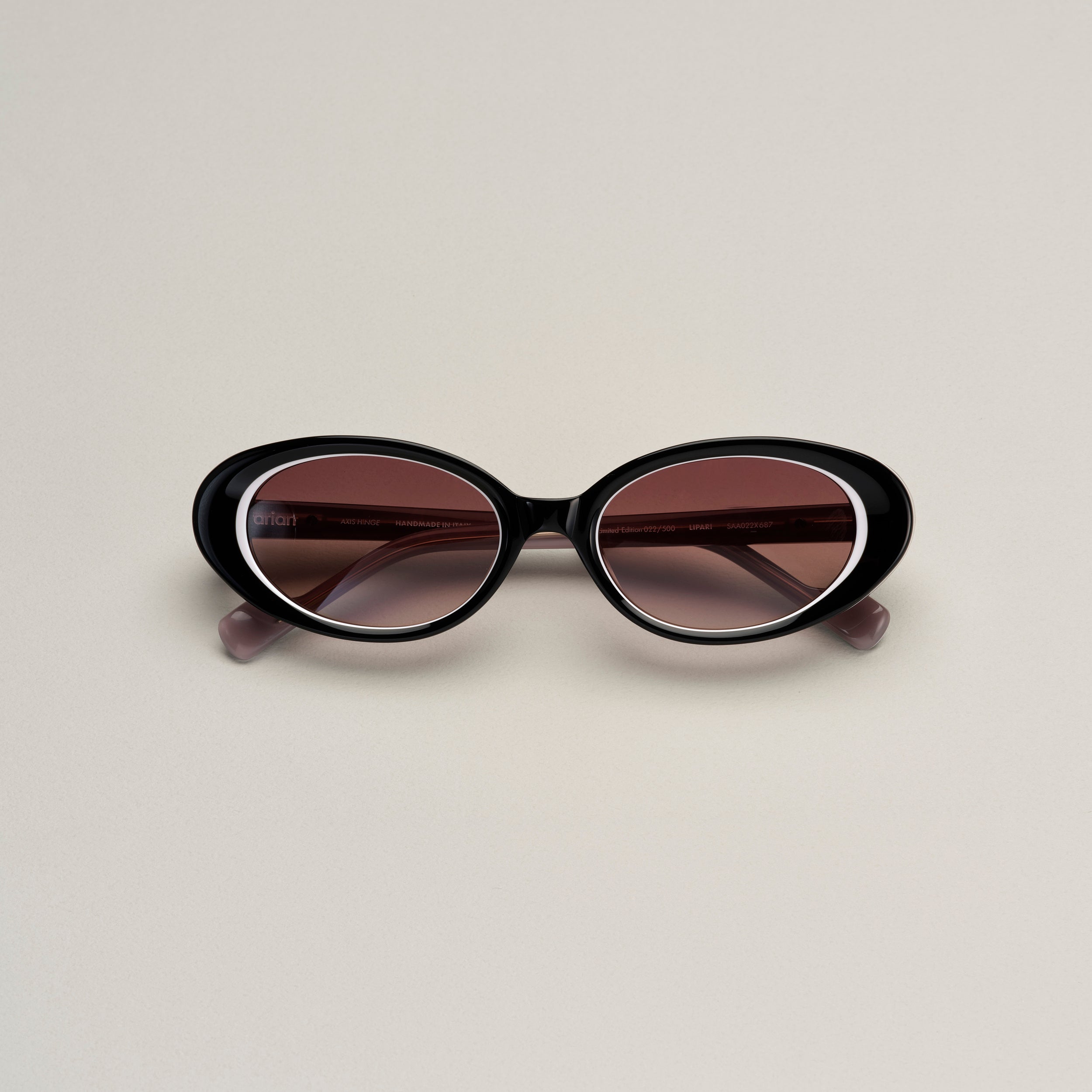 Tarian-Lipari-small-oval-cateye-sunglasses-black-white