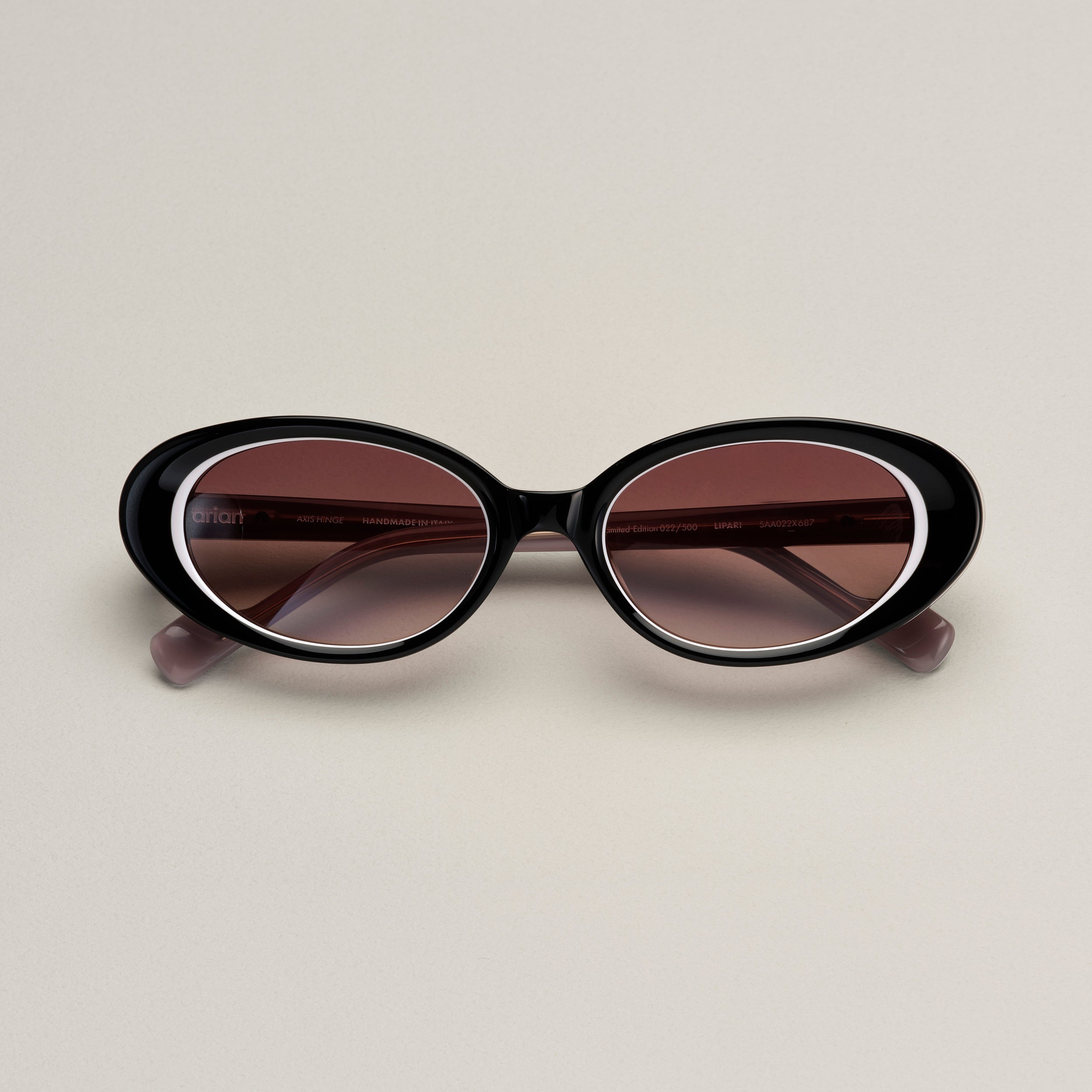 Tarian-Lipari-small-oval-cateye-sunglasses-black-white