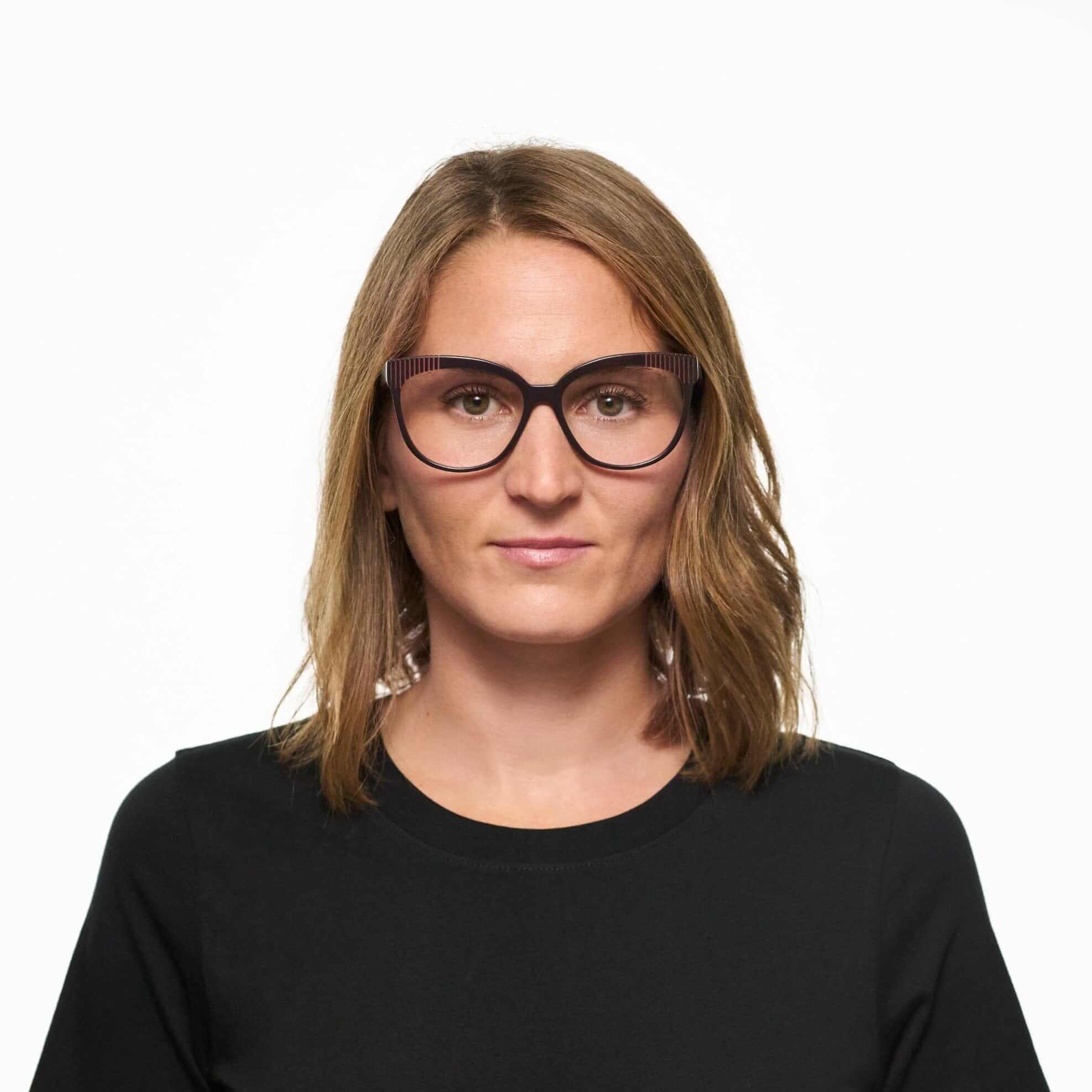 Tarian-Bastille-cateye-eyewear-portrait-dark-khaki-orange